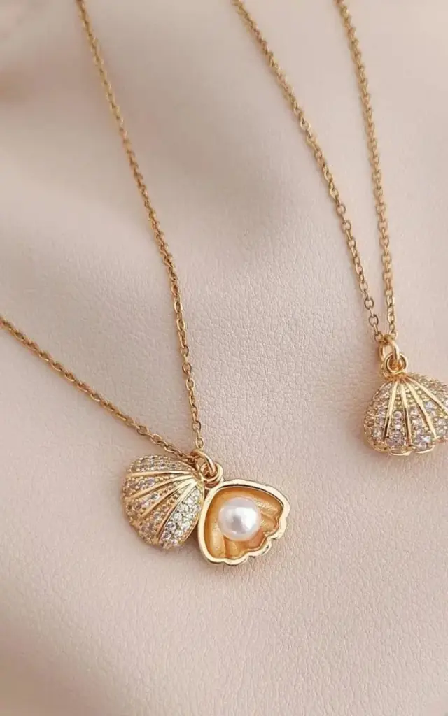 Uncover hidden beauty with the Pearl Whisper Locket
